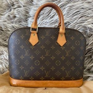 Louis Vuitton Alma Handbag